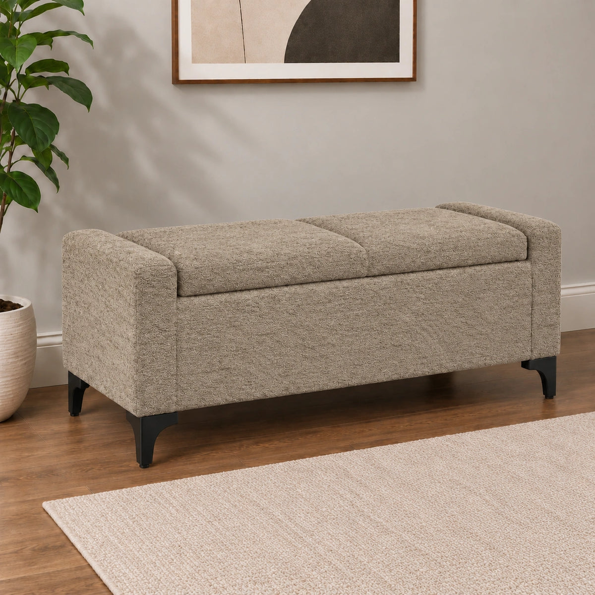 Beige modern storage ottoman bench with upholstered arms and black legs