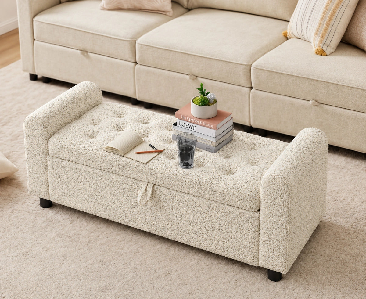 Cream tufted storage ottoman bench styled in a living room