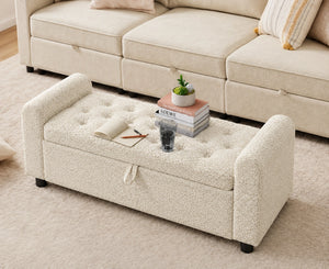 Cream tufted storage ottoman bench styled in a living room
