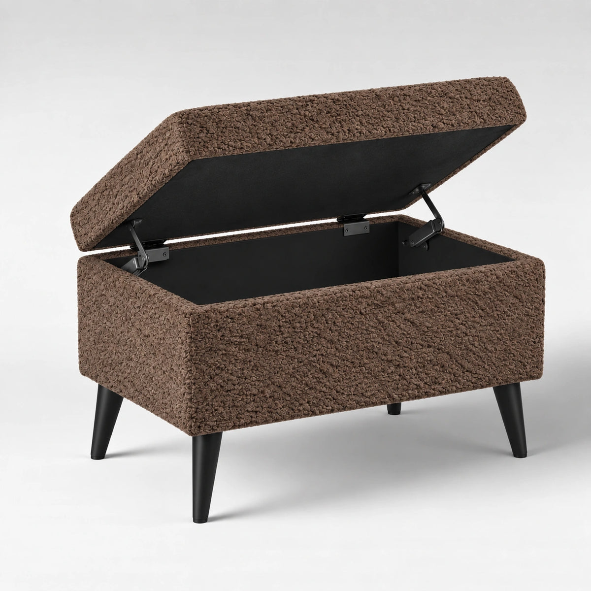 Dark brown storage ottoman with open interior compartment