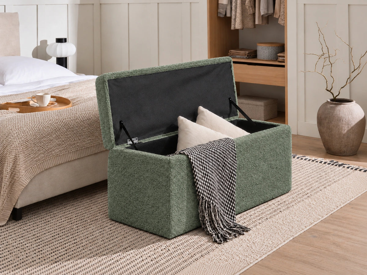 Green storage ottoman with open hidden storage compartment