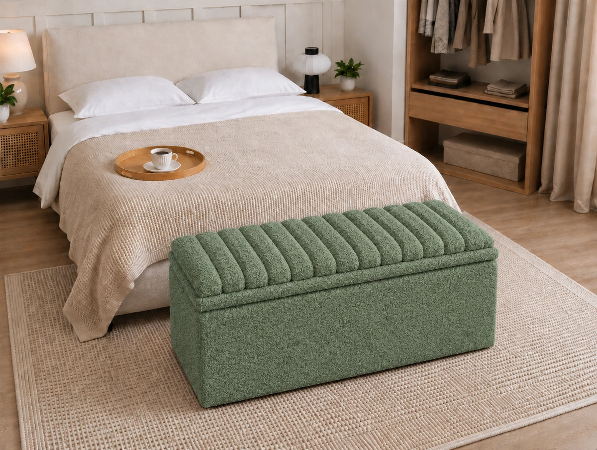 Green upholstered storage ottoman with channel tufted top