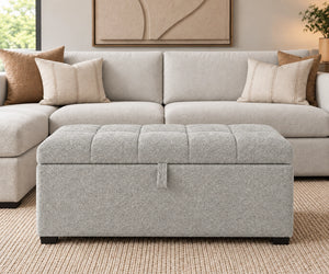 Light grey tufted storage ottoman with lift-up top