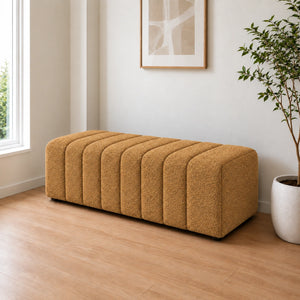 Mustard brown channel tufted ottoman with rounded edges