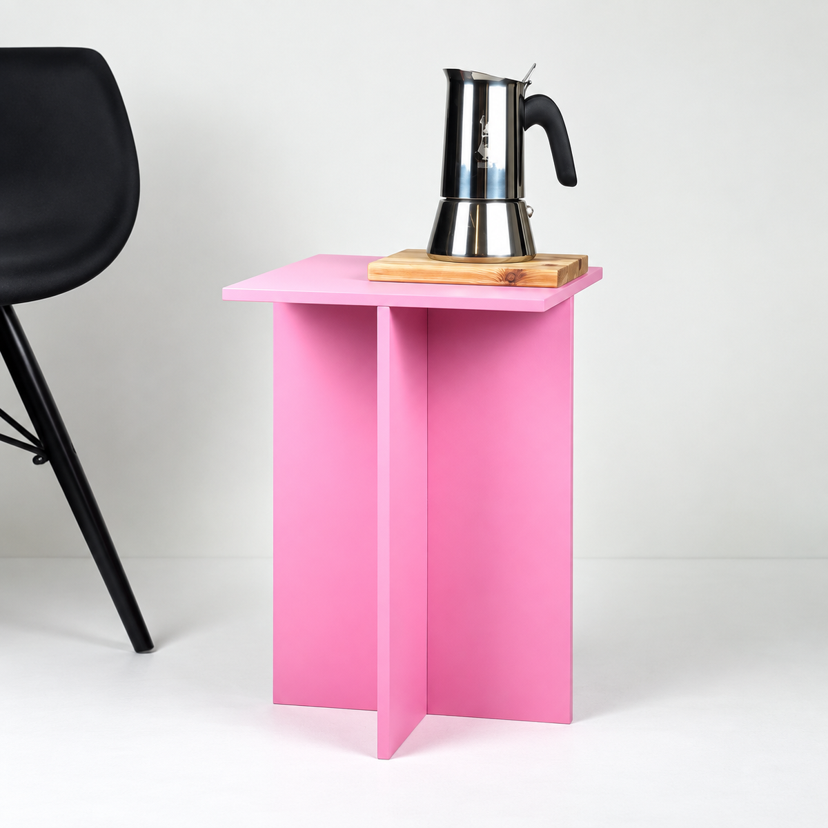 Pink end table on white background