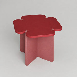 Red flower-shaped end table top view