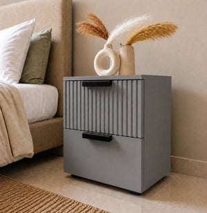 Modern Grey Solid Wood bedside table with two storage drawers and decorative vase styling in a contemporary bedroom.