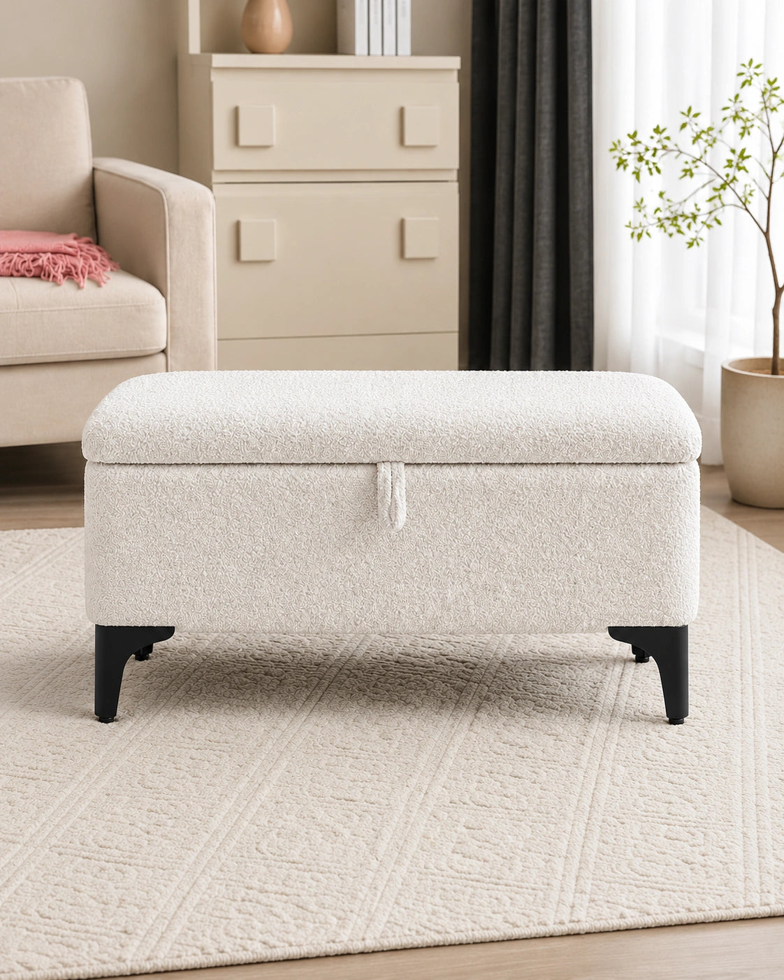 Modern white storage ottoman bench with upholstered seat and black tapered legs