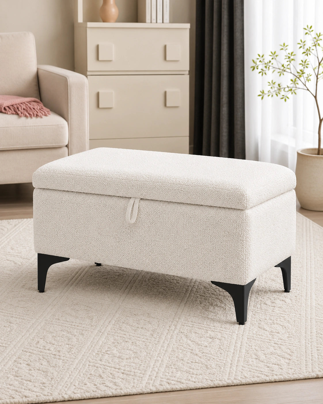 White upholstered storage ottoman bench with black legs in modern living room