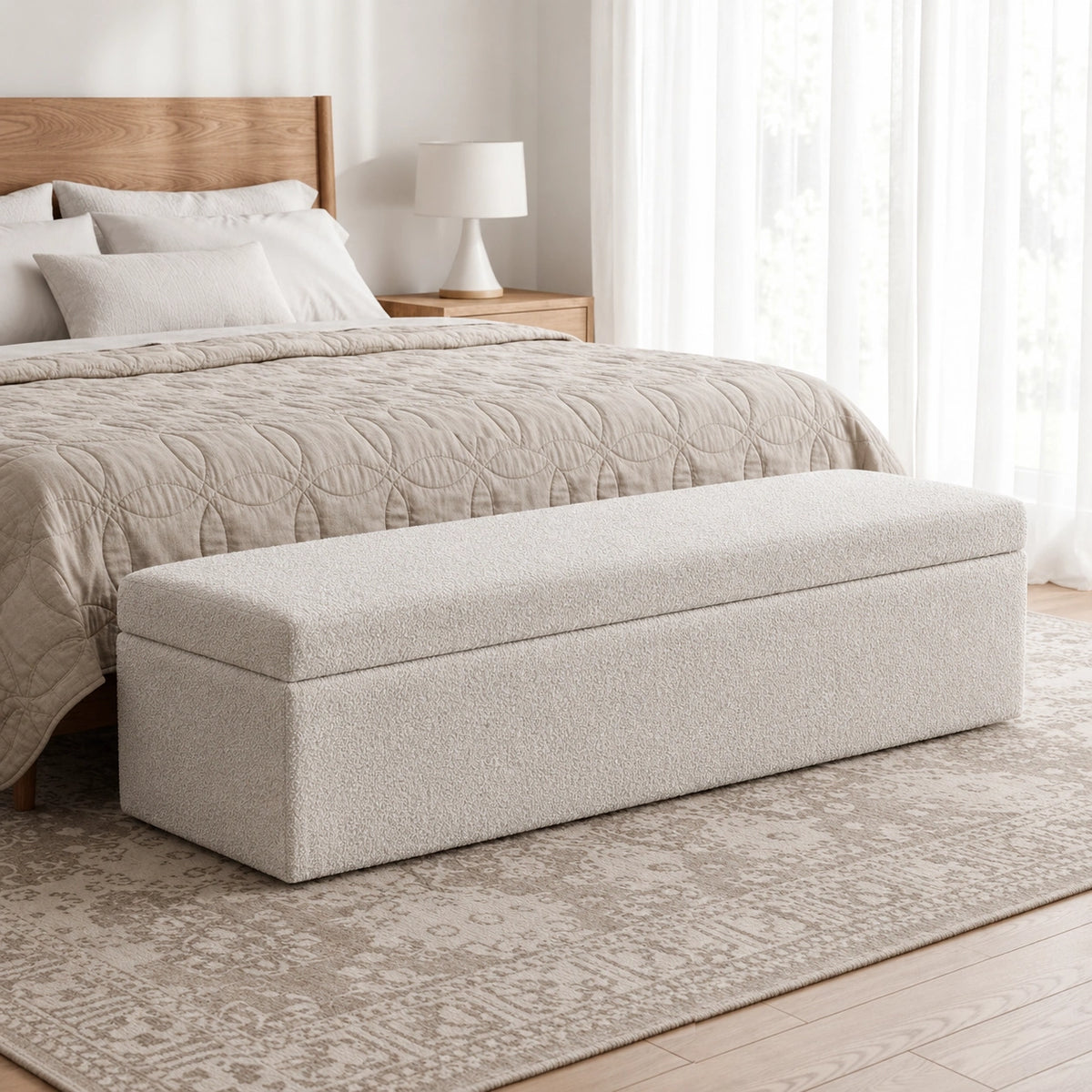 White upholstered storage ottoman bench side view