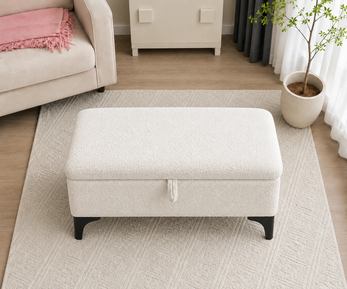Top view of white upholstered storage ottoman bench with textured fabric