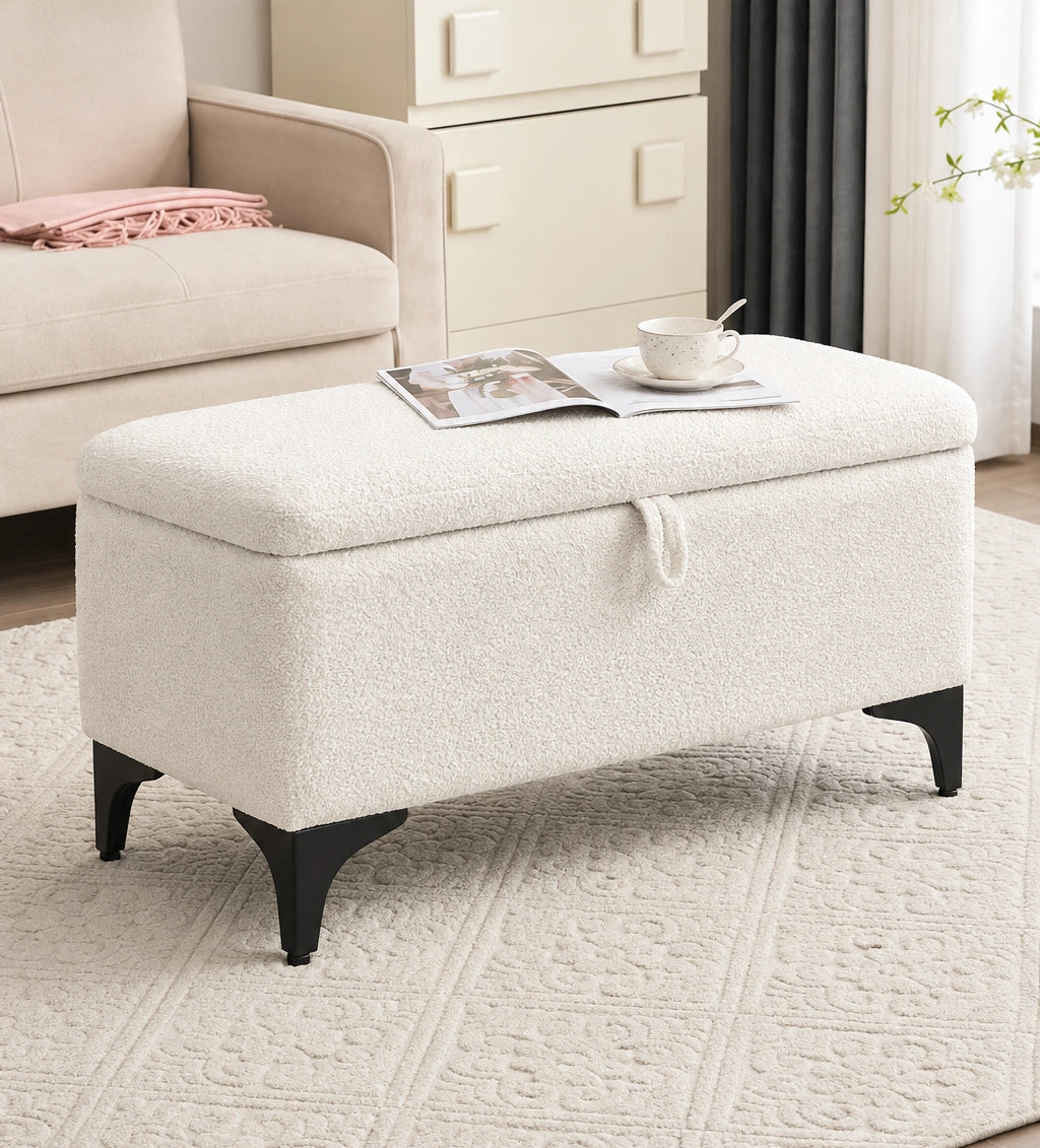White textured storage ottoman bench styled with magazine and coffee cup