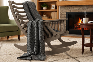 Wooden frame rocking chair with grey blanket